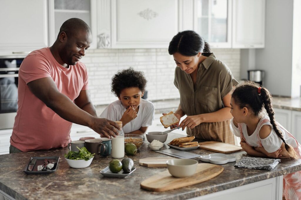 Family making a meal together to practice healthy habits